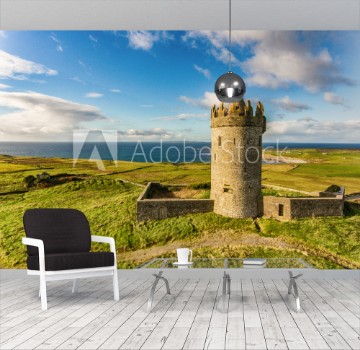 Bild på Aerial Famous Irish Tourist Attraction In Doolin County Clare Ireland Doonagore Castle is a round 16th-century tower Castle Aran Islands and along The Wild Atlantic Way